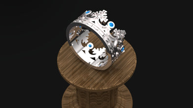Add royal elegance to your style with this sterling silver crown ring. Choose custom blue or green zircon gemstones. Perfect gift for men & women.