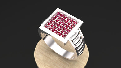 The Apex custom men's ring in 925 silver, shown with bold red rubies.