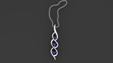 The Kaia 925 silver journey pendant shown with three deep sapphire blue stones