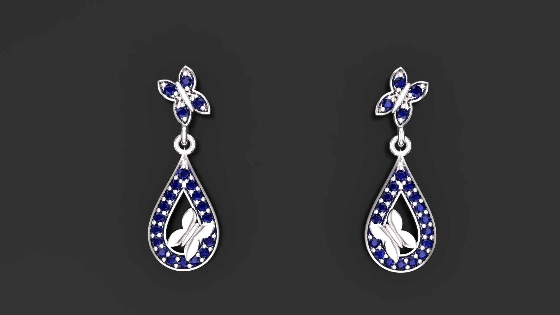 "Minzaari Jewels' Faraasha butterfly earrings with royal sapphire blue stones."