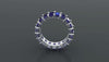 "Minzaari Jewels' Orion eternity band with royal sapphire blue emerald-cut stones.